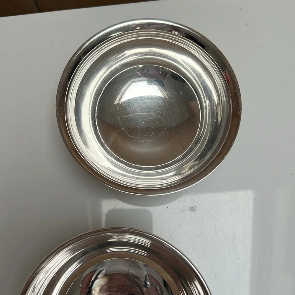 3 silver plated dishes.